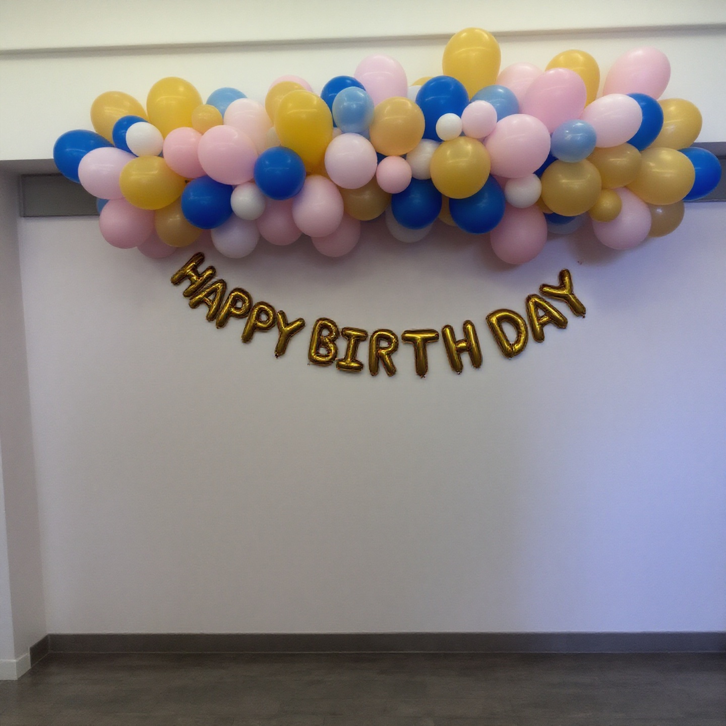 Pastel birthday balloon styling